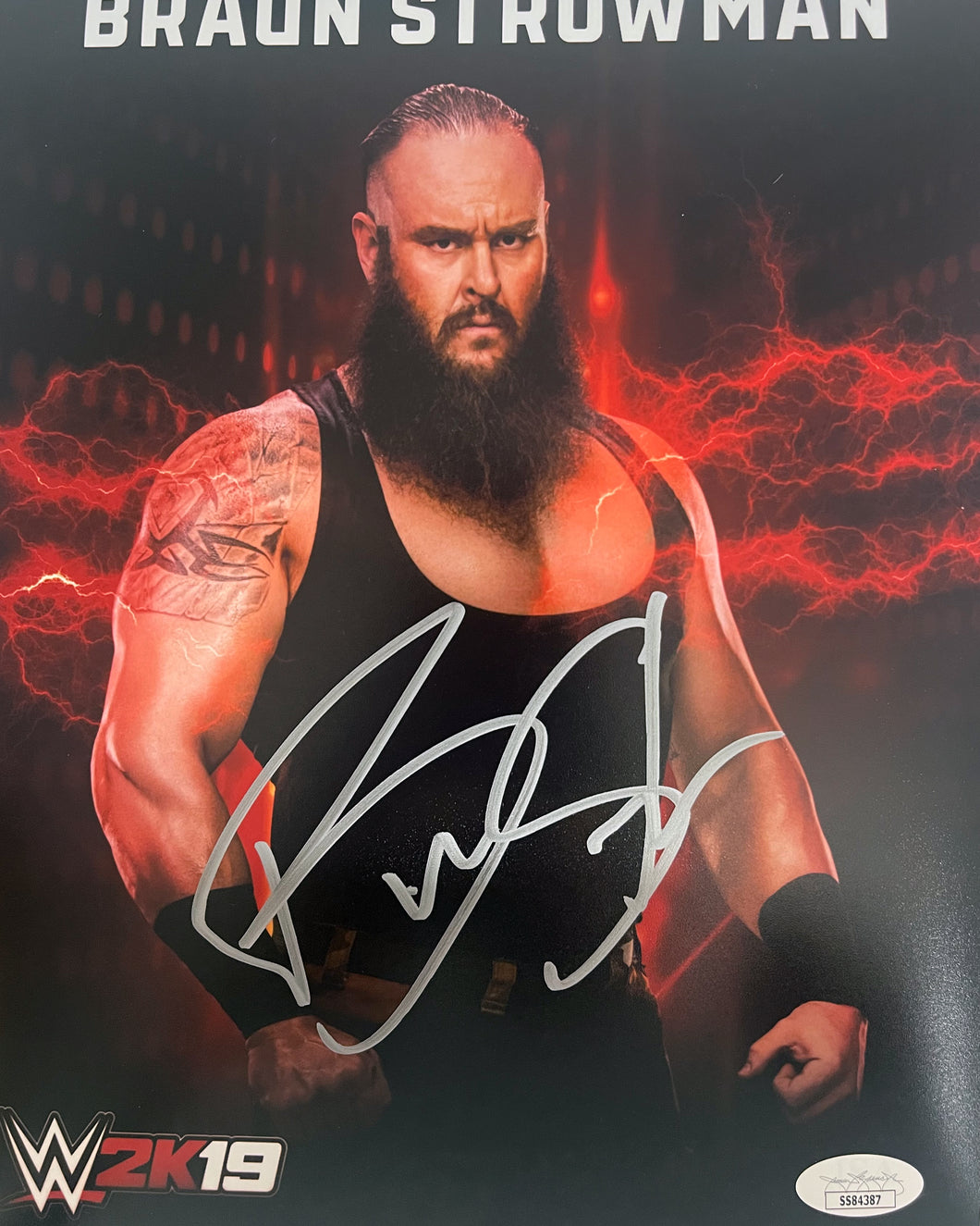 Braun Strowman signed WWE 8x10 Adam Scherr  Comes with JSA sticker